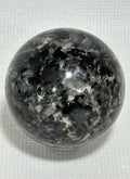 Small polished black crystal sphere mineral specimen for collection, display, decor