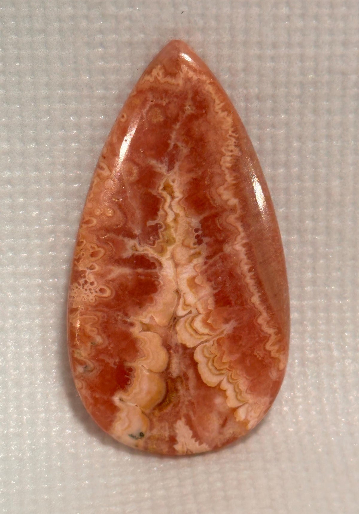 Rhodochrosite cabochon, creamy banding, for jewelry making