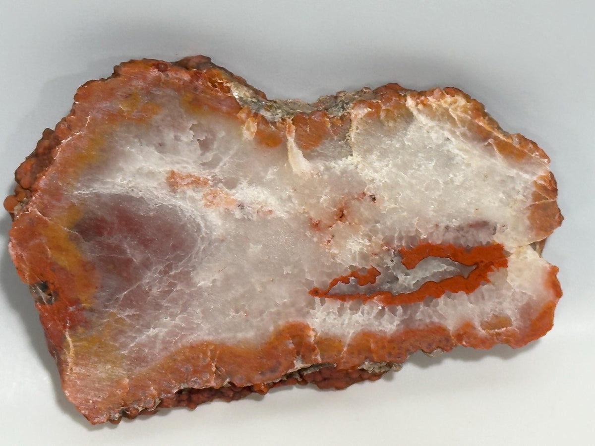 Utah red grape agate nodule cross section slab from San Rafael Swell