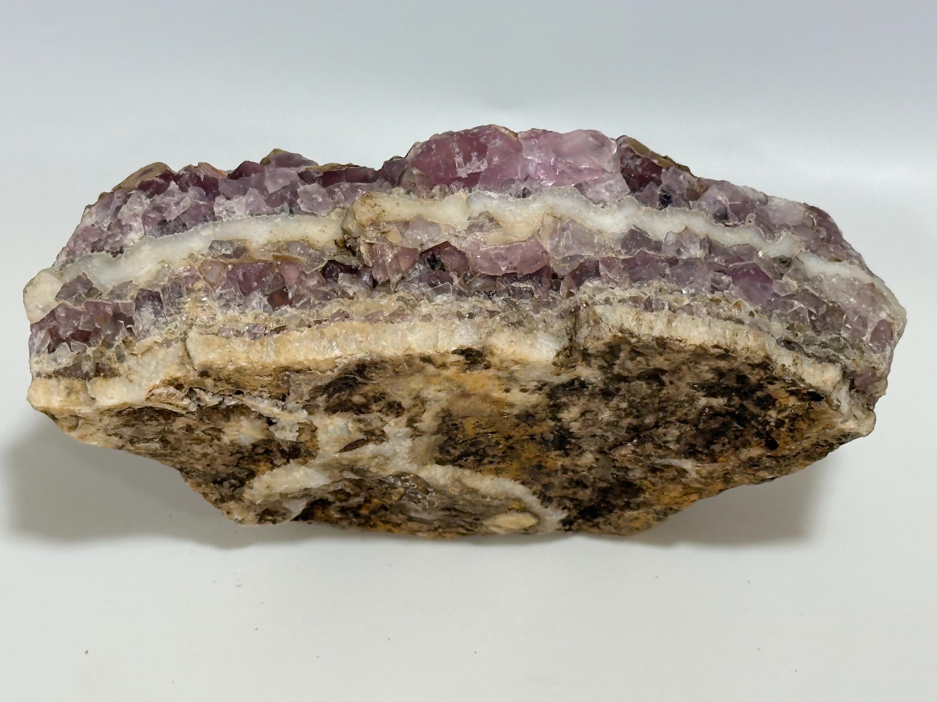 Natural Chevron Amethyst unpolished display piece or for lapidary use