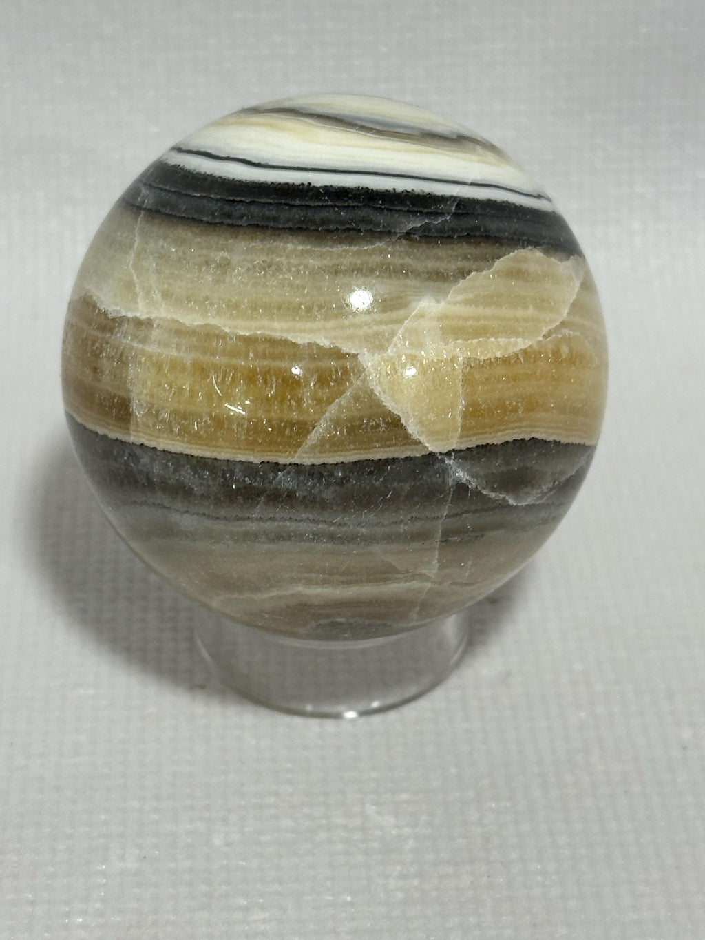 Banded Calcite Zebra Onyx 2.28 inch yellow and black colored sphere for reiki, energy healing, display, decor