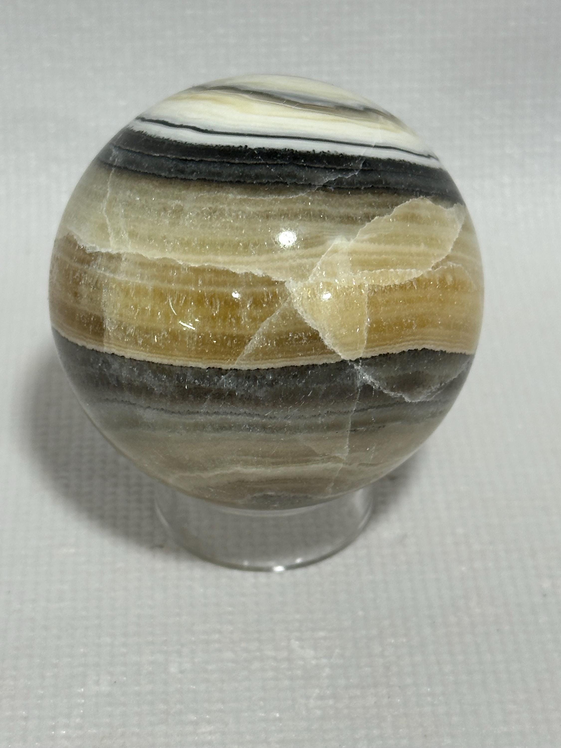 Banded Calcite Zebra Onyx 2.28 inch yellow and black colored sphere for reiki, energy healing, display, decor