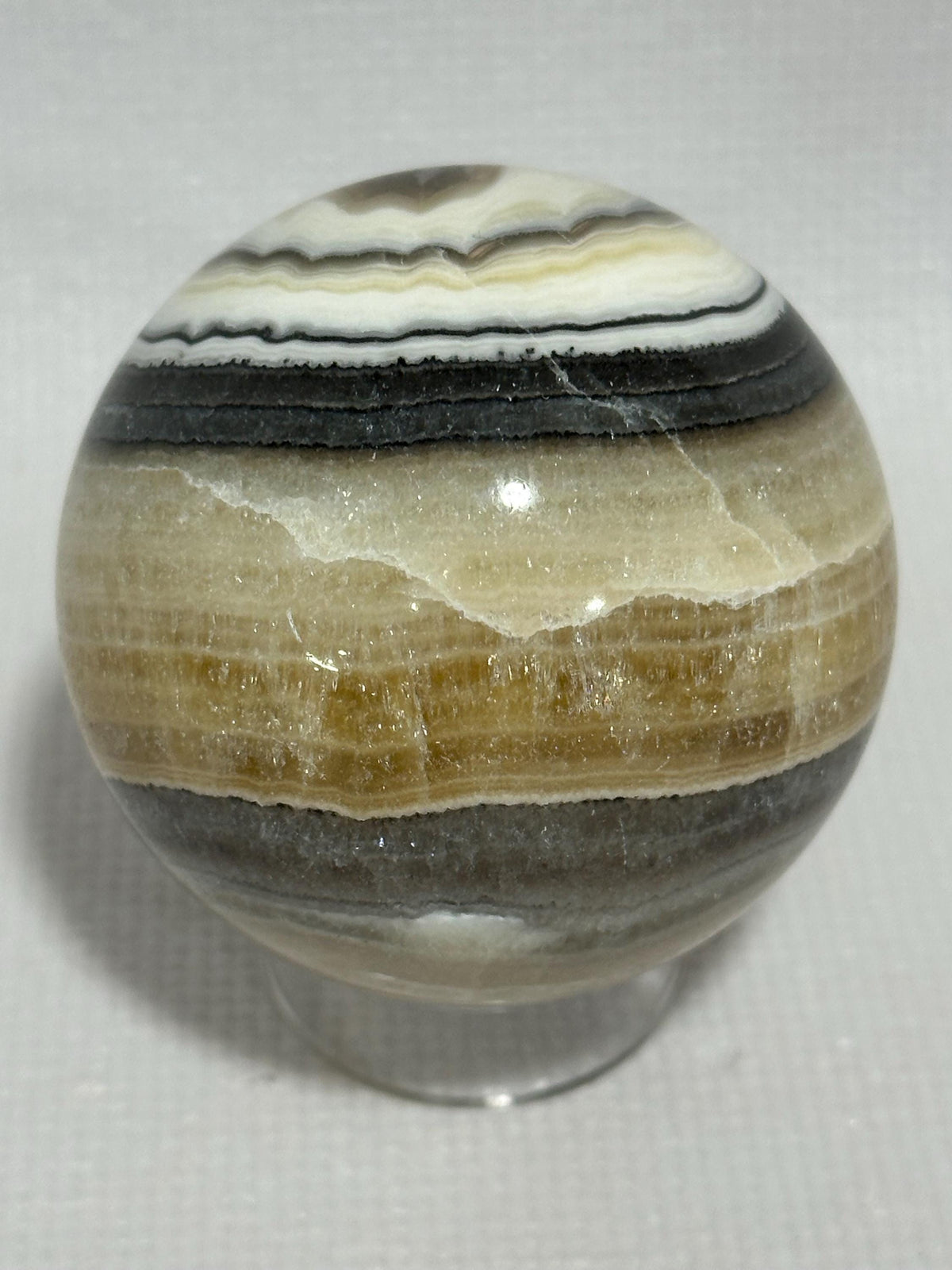 Banded Calcite Zebra Onyx 2.28 inch yellow and black colored sphere for reiki, energy healing, display, decor