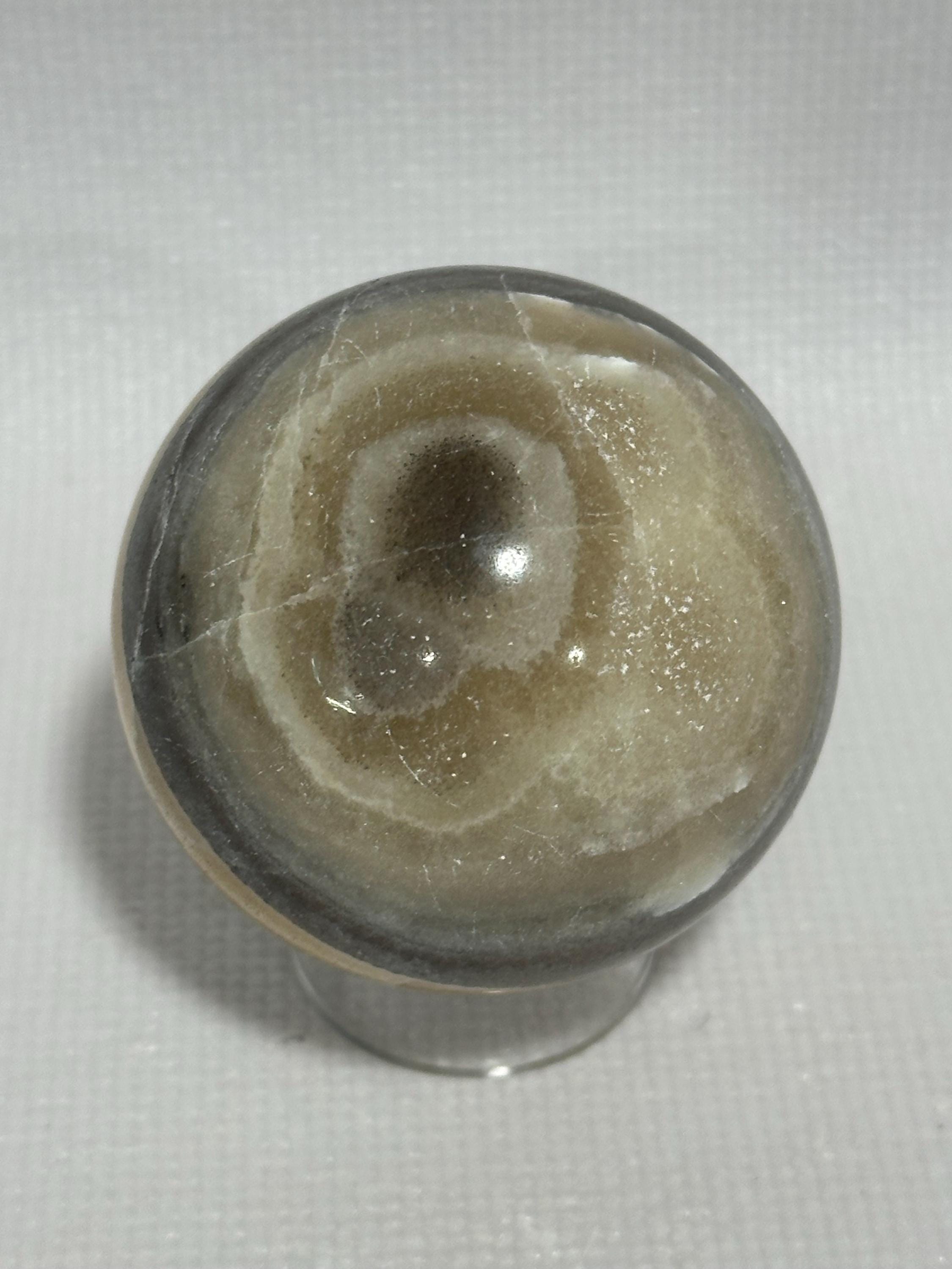 Banded Calcite Zebra Onyx 2.28 inch yellow and black colored sphere for reiki, energy healing, display, decor