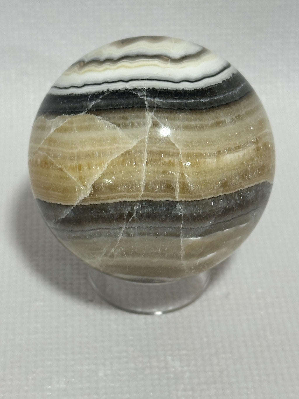 Banded Calcite Zebra Onyx 2.28 inch yellow and black colored sphere for reiki, energy healing, display, decor