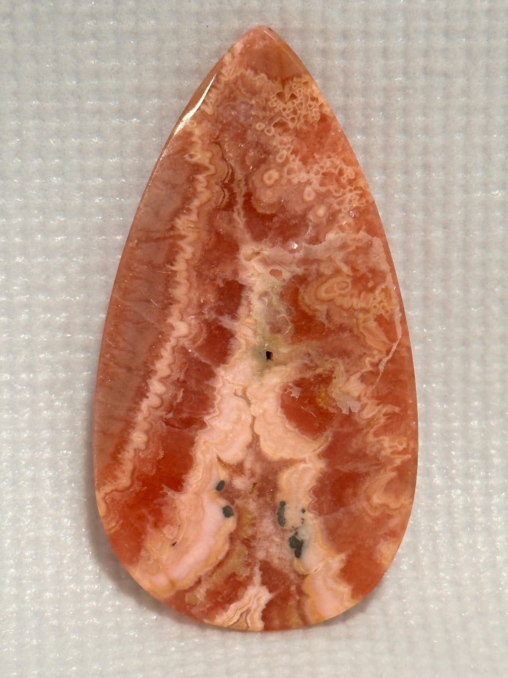 Rhodochrosite cabochon, creamy banding, for jewelry making