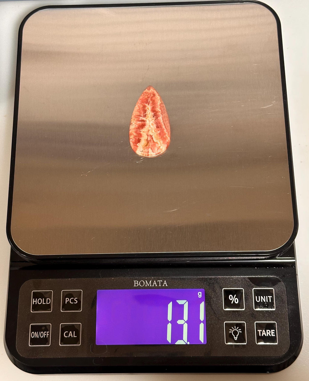Rhodochrosite cabochon, creamy banding, for jewelry making