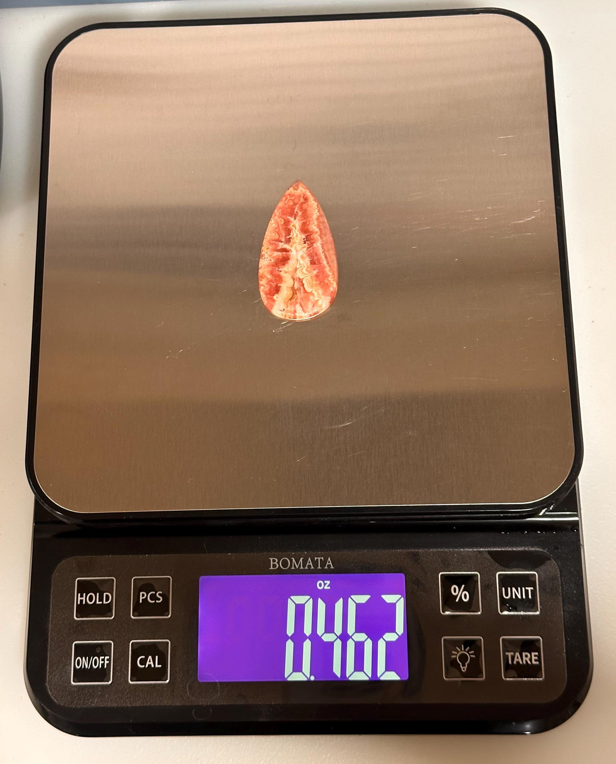 Rhodochrosite cabochon, creamy banding, for jewelry making