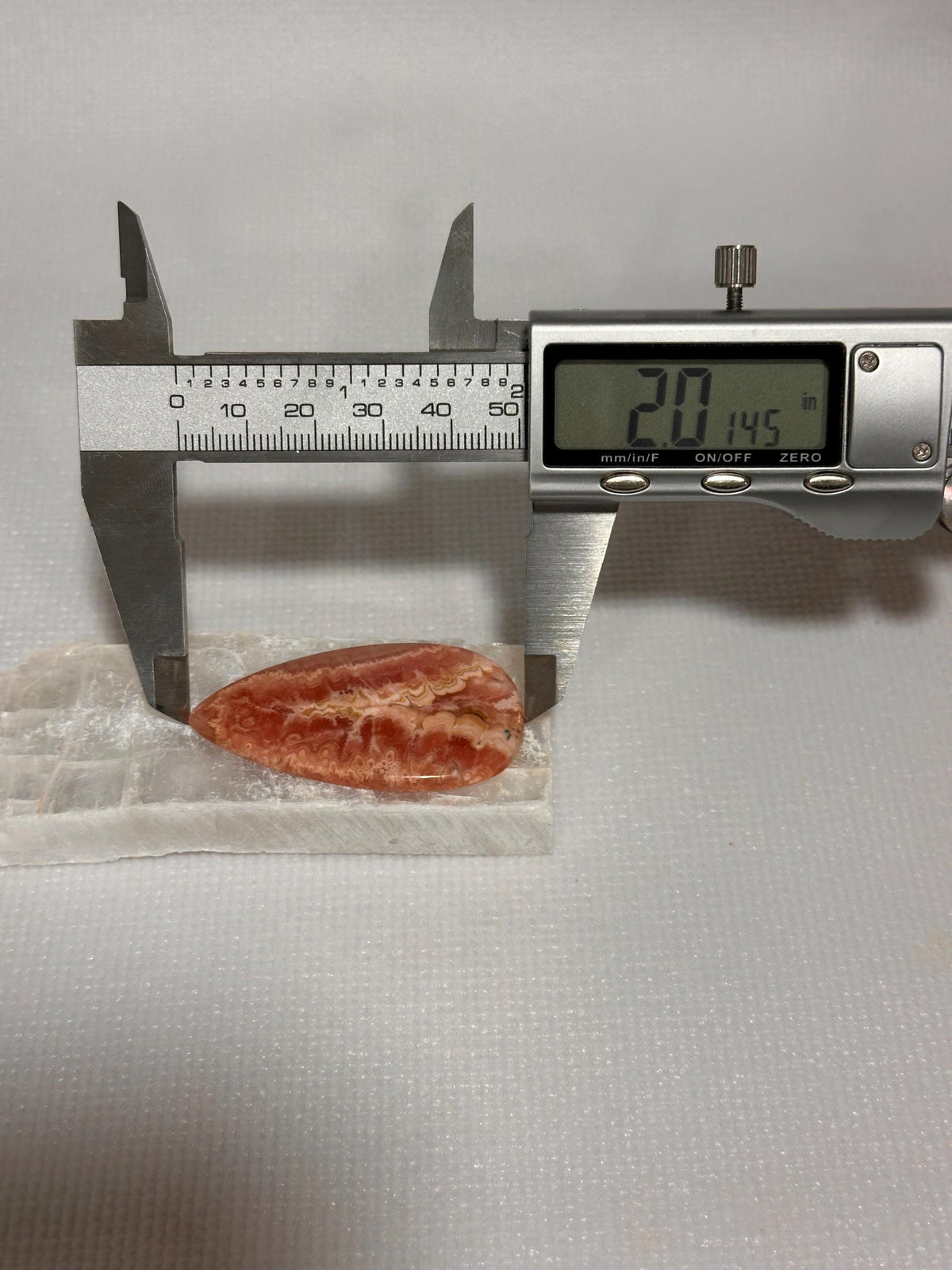 Rhodochrosite cabochon, creamy banding, for jewelry making