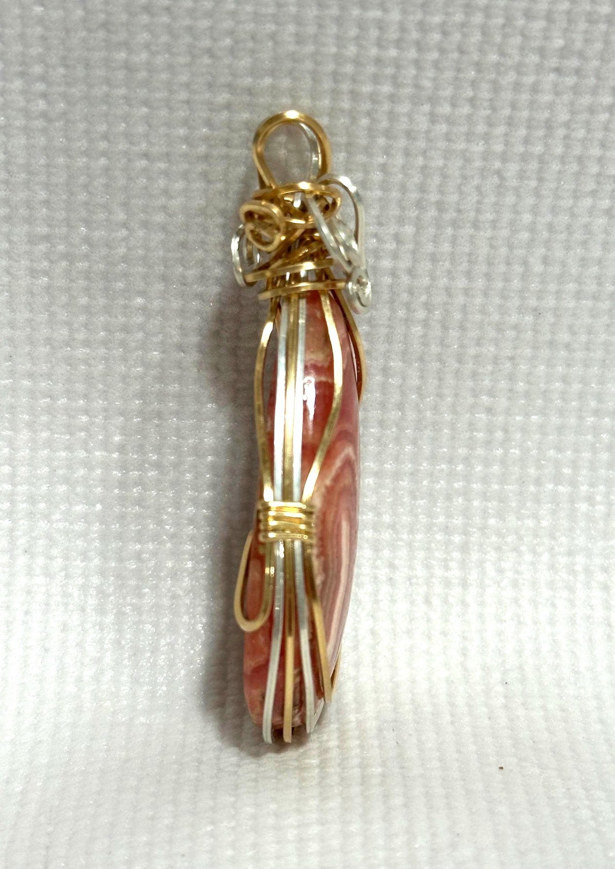 Whimsical Rhodochrosite pendant, two-tone wire wrapped in tarnish-resistant Argentium Silver and 14/20 yellow gold