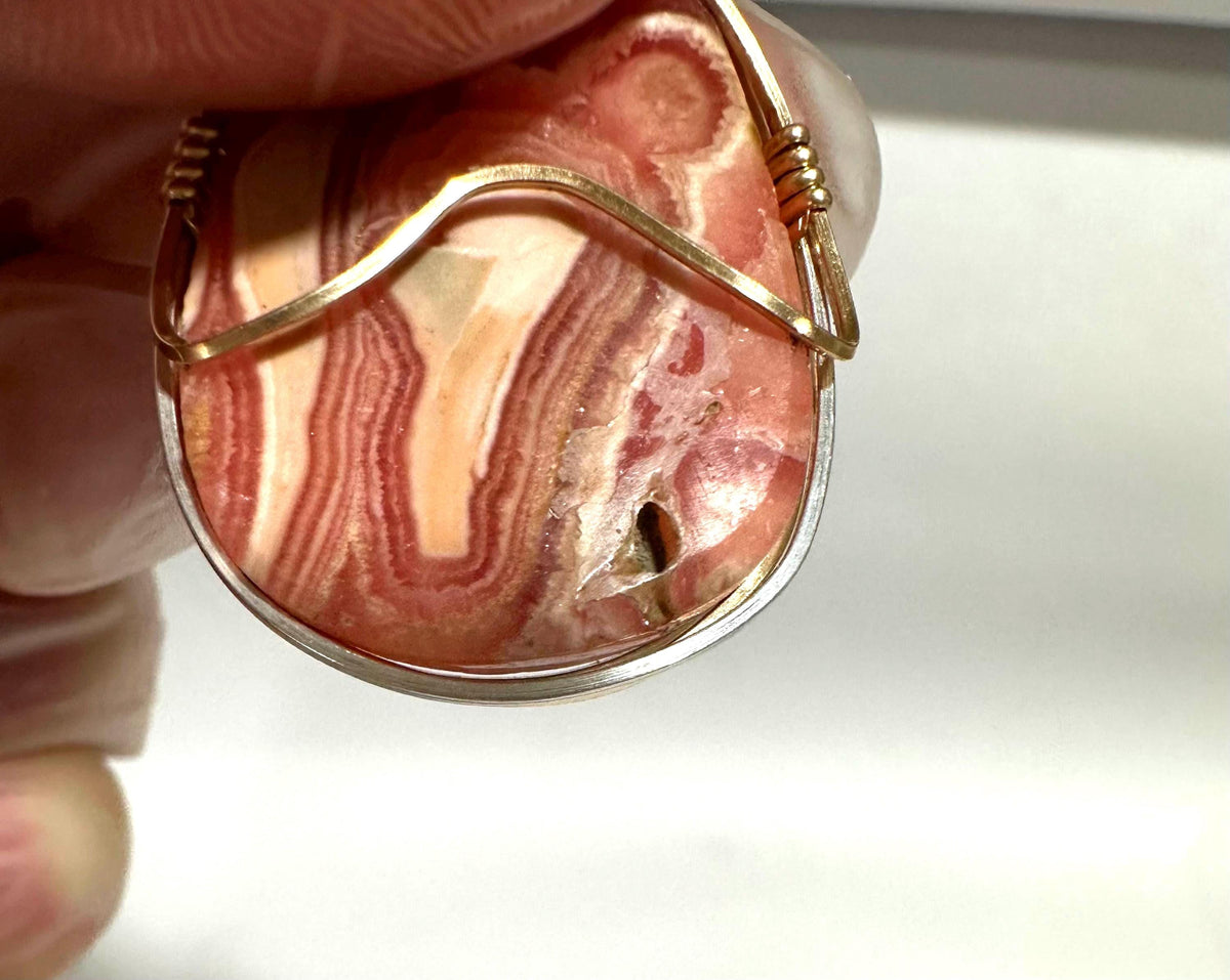 Whimsical Rhodochrosite pendant, two-tone wire wrapped in tarnish-resistant Argentium Silver and 14/20 yellow gold