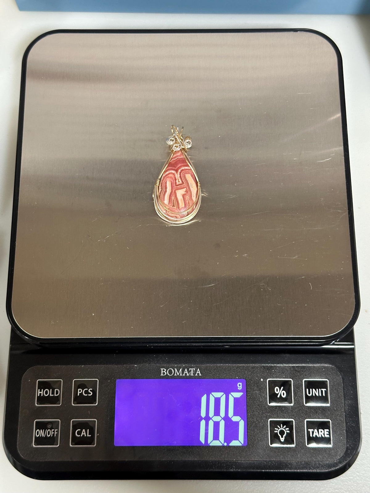 Whimsical Rhodochrosite pendant, two-tone wire wrapped in tarnish-resistant Argentium Silver and 14/20 yellow gold