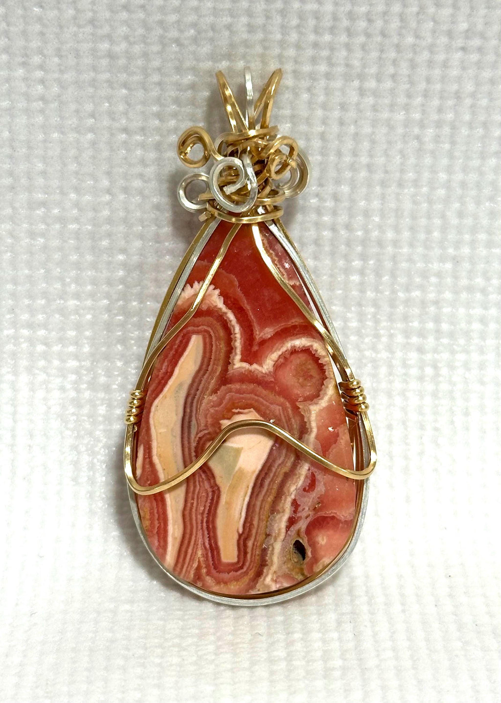 Whimsical Rhodochrosite pendant, two-tone wire wrapped in tarnish-resistant Argentium Silver and 14/20 yellow gold