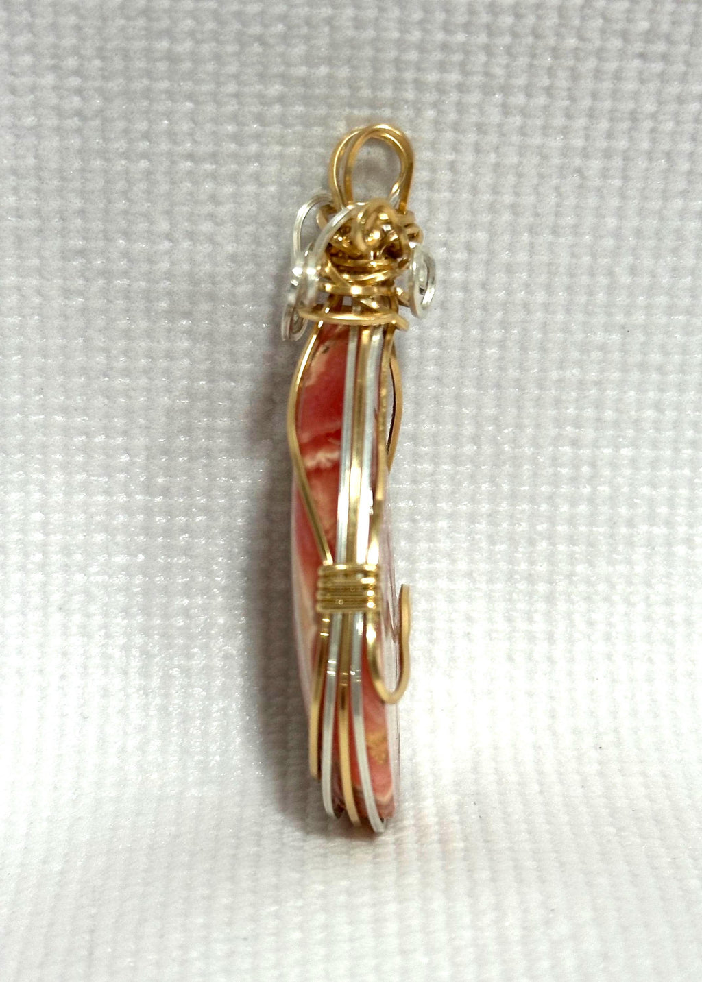 Whimsical Rhodochrosite pendant, two-tone wire wrapped in tarnish-resistant Argentium Silver and 14/20 yellow gold