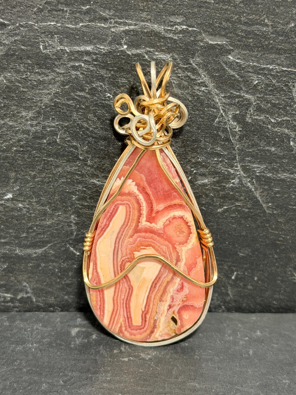 Whimsical Rhodochrosite pendant, two-tone wire wrapped in tarnish-resistant Argentium Silver and 14/20 yellow gold